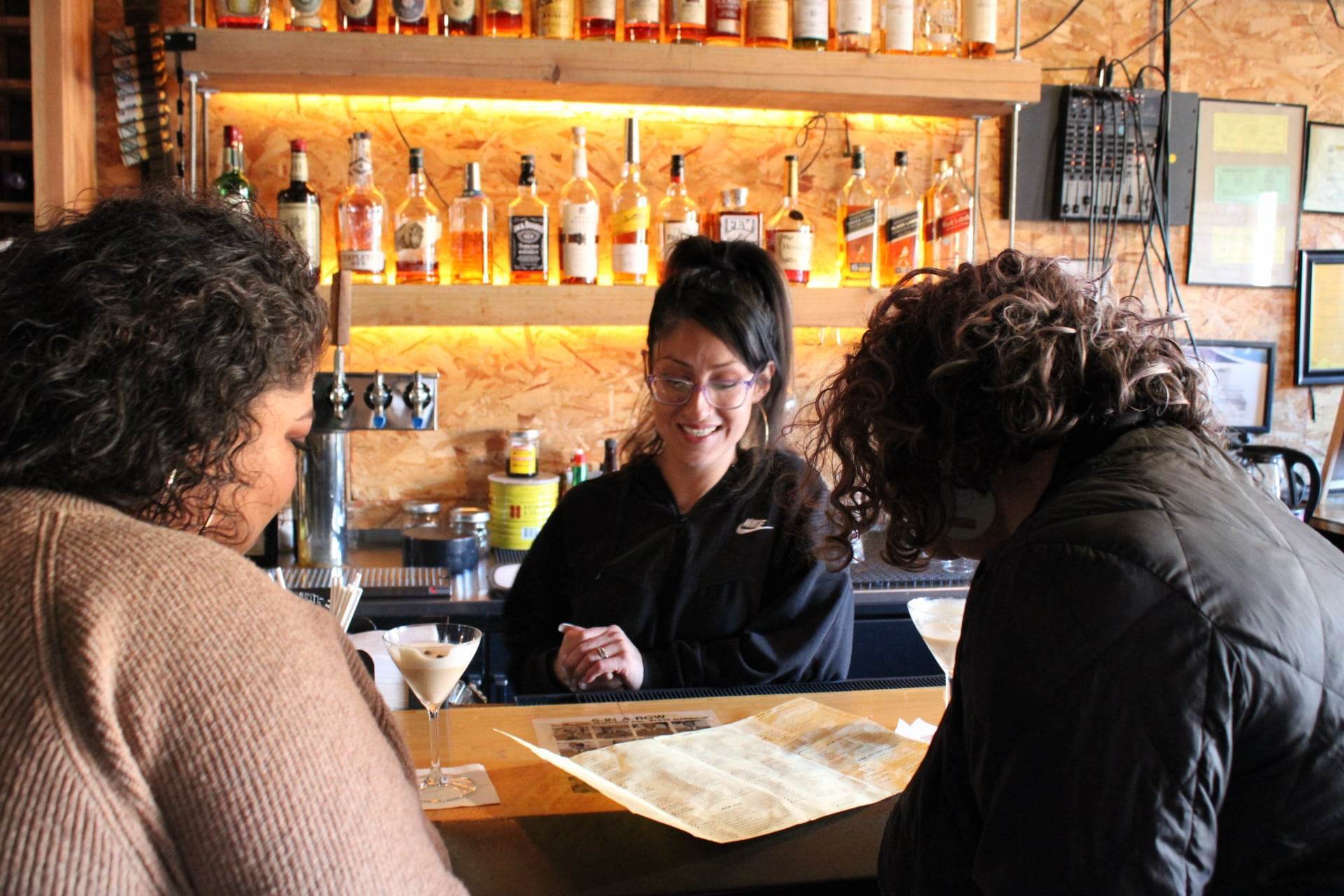 Bartender with customers