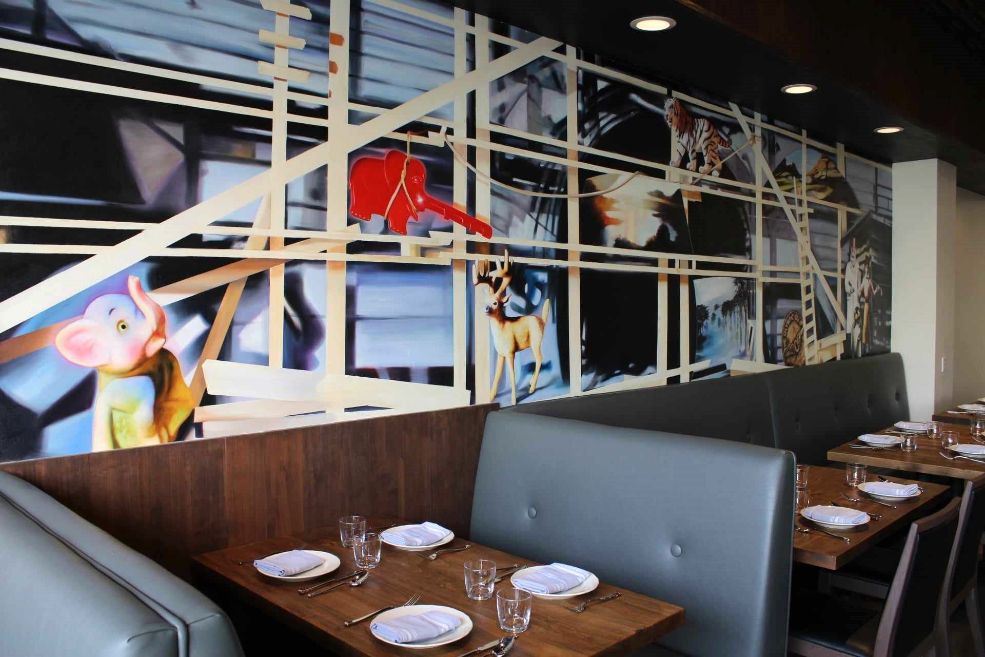 Abstract mural with dining booths