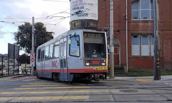 Streetcar exits storage yard.