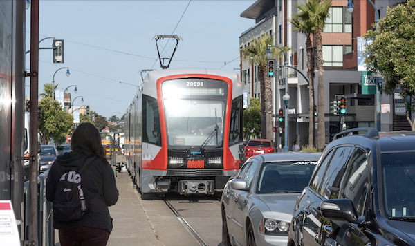 Streetcar in traffic.