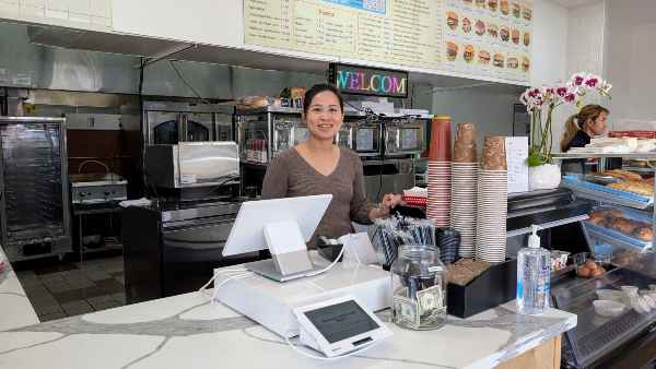 Woman at counter.