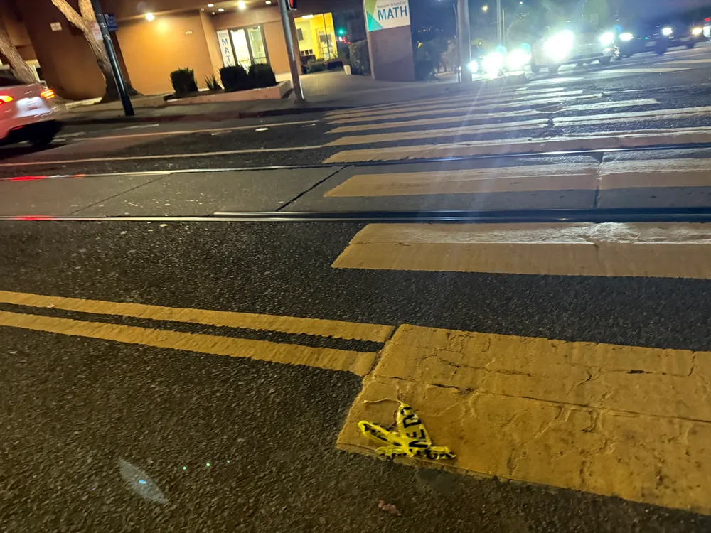 Street with caution tape.