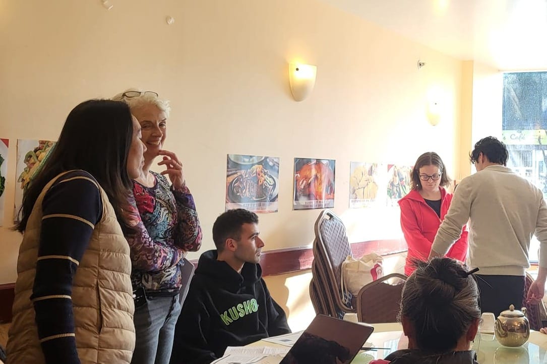 People stand around.