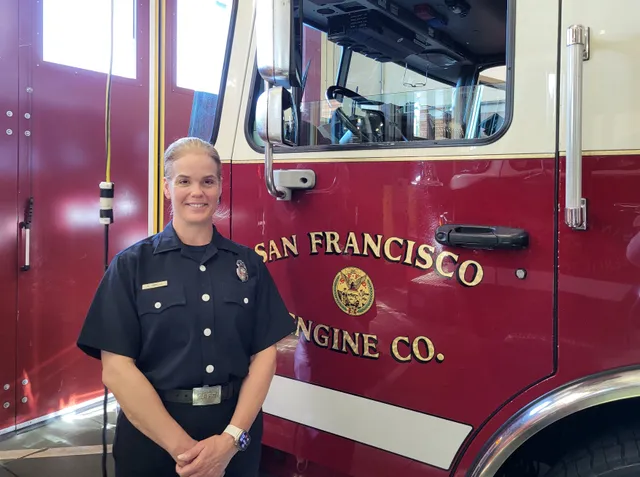 Woman at fire engine.