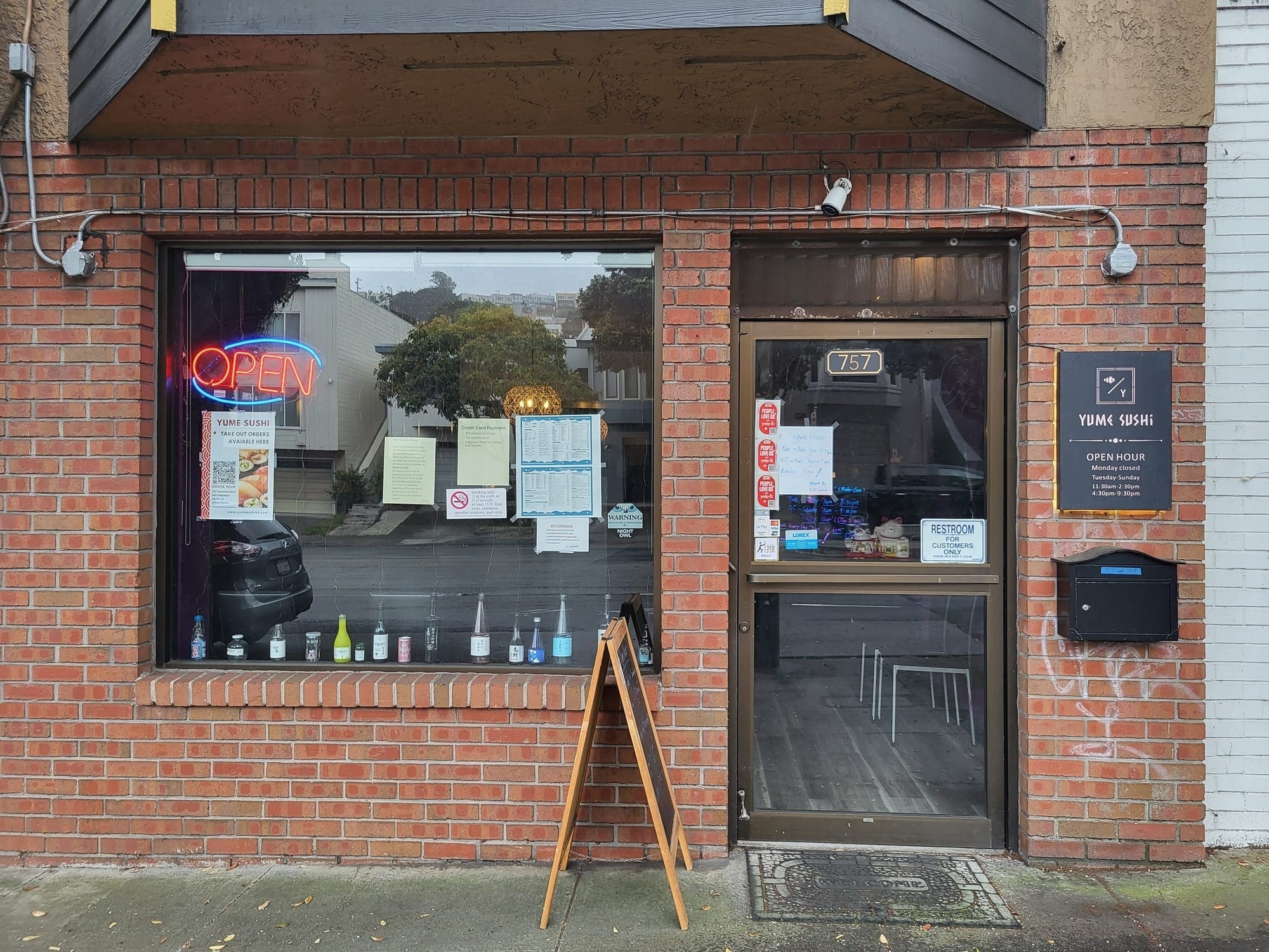 Storefront with open sign.