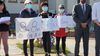 Advocates with signs