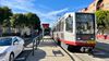 Car, streetcar boarding island and streetcar