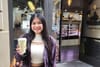 Woman holding coffee