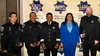 Officials with police officers