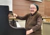 Woman at piano.