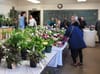 People looking at plants.