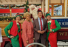 Assessor-Recorder Joaquin Torres with the Holly, Jolly Trolley