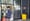 Man walks by storefont