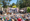 A crowd of concert goers in tie-day enjoying live music.